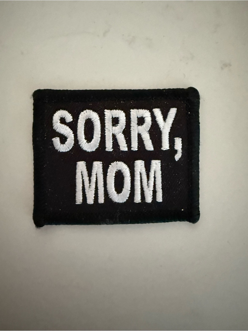 Black 'SORRY, MOM' Embroidered Patch